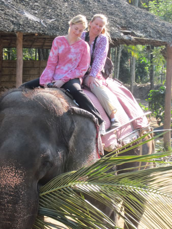 Jan and Amanda riding an elephant